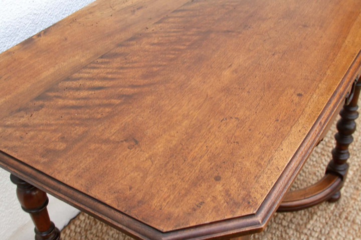 19th Century French Walnut Antique Writing Table with decorative craftsmanship and elegant design, reflecting provincial France artistry.
