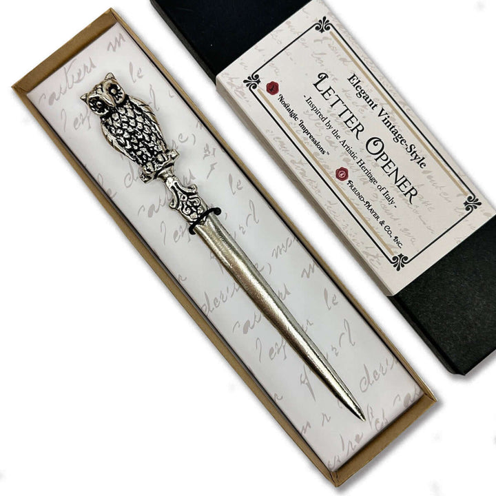 Decorative letter opener in a vintage-style box with text