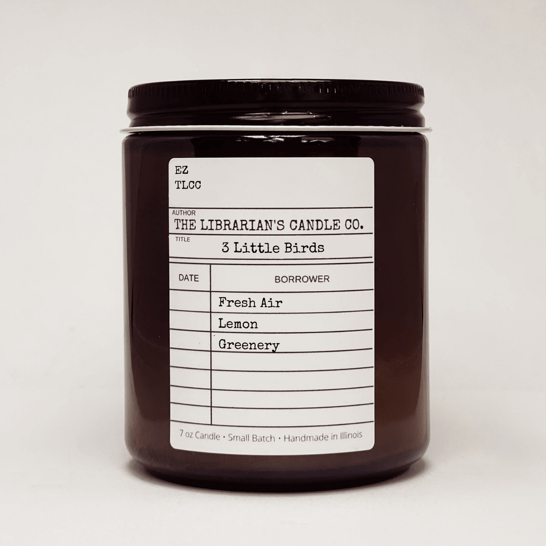 3 Little Birds Scented Candle: Fresh Air, Lemon & Greenery in a vintage apothecary jar, evoking peace and natural freshness.