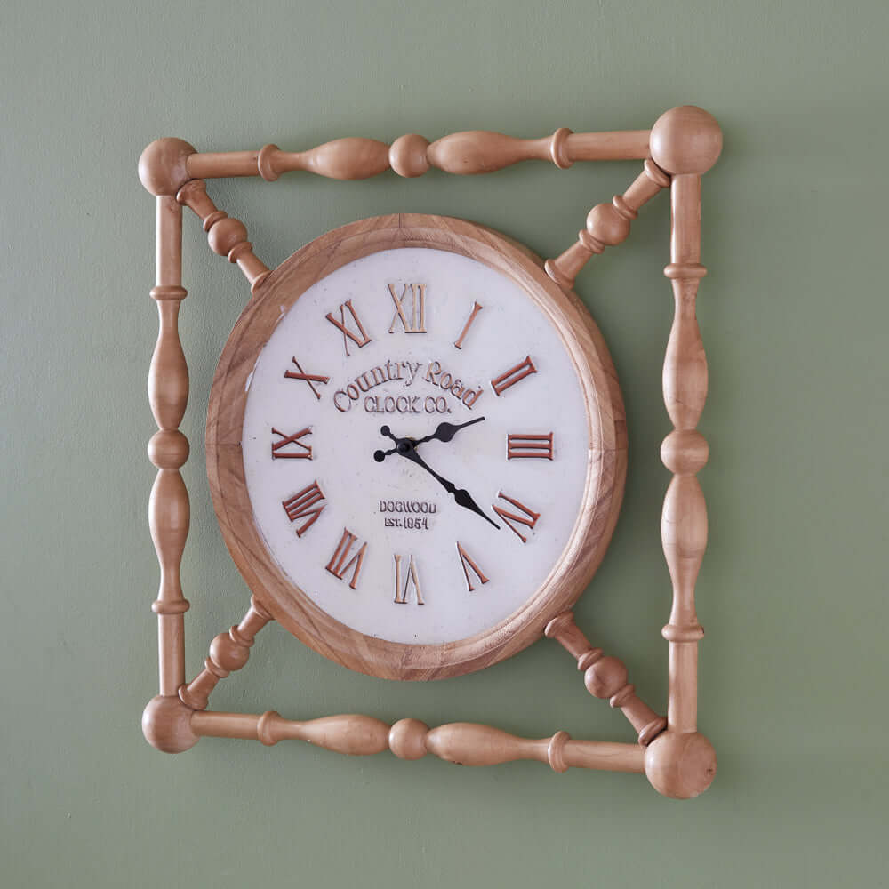 Rustic wooden farmhouse wall clock with vintage country road design, featuring honey-toned wood and Roman numerals.