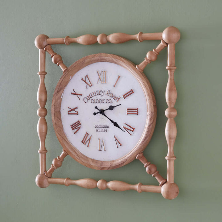 Rustic wooden farmhouse wall clock with vintage country road design, featuring honey-toned wood and Roman numerals.