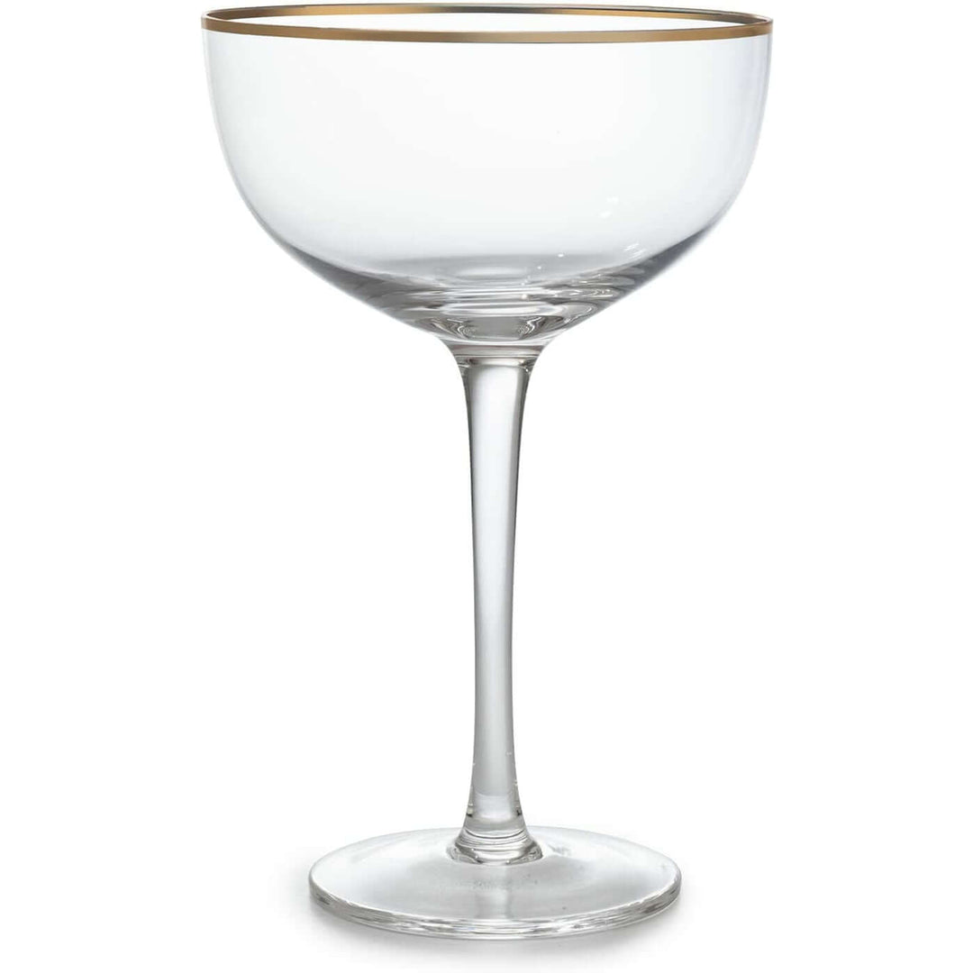 Clear glass with gold rim on a white background