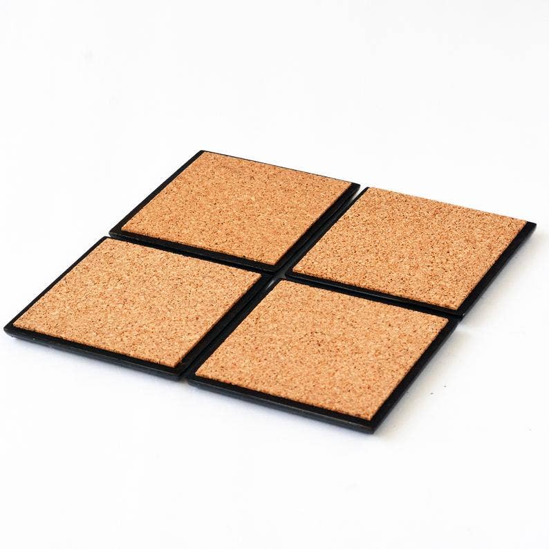 Cork coasters  with black border on a white background