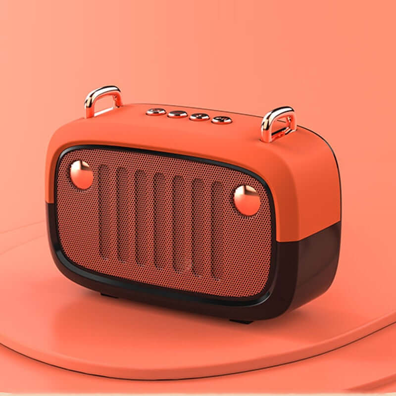 Orange portable speaker on a matching orange background