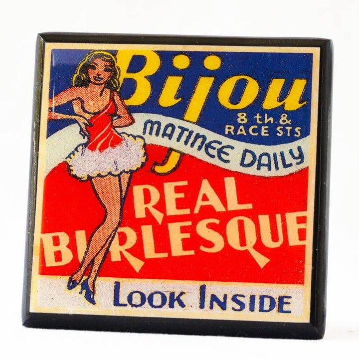 Vintage-style product packaging with a woman in a red dress and 'Bijou' branding.