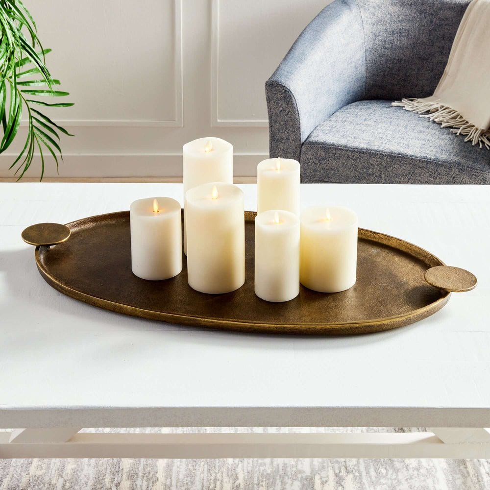 Antique Brass Decorative Tray with Handles with candles placed on it