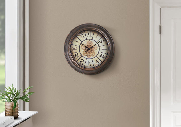 Decorative wall clock on a beige wall with a plant on a windowsill.