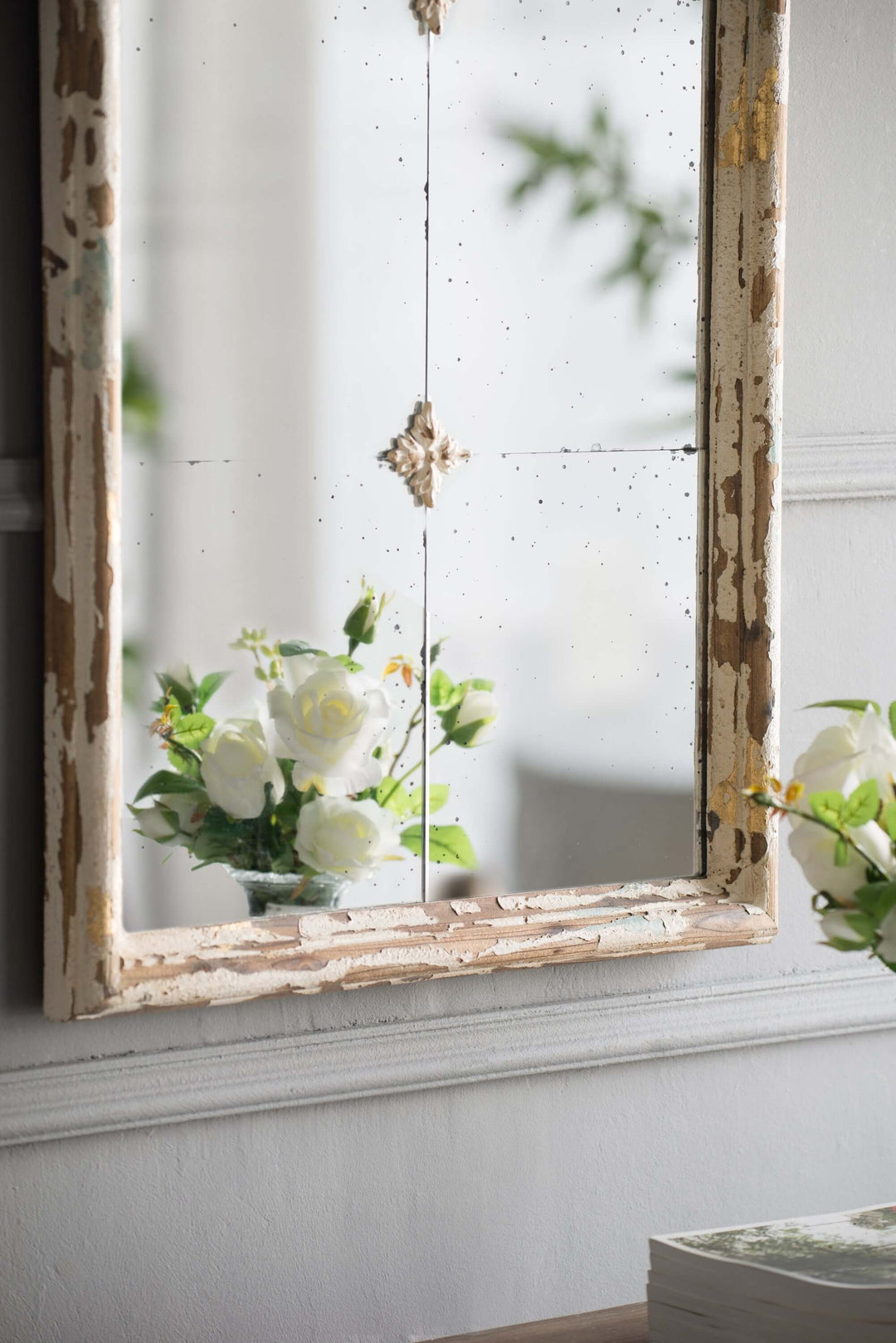 Antique Cream & Gold Arched Wall Mirror reflecting white flowers and green foliage in a French Country style interior.