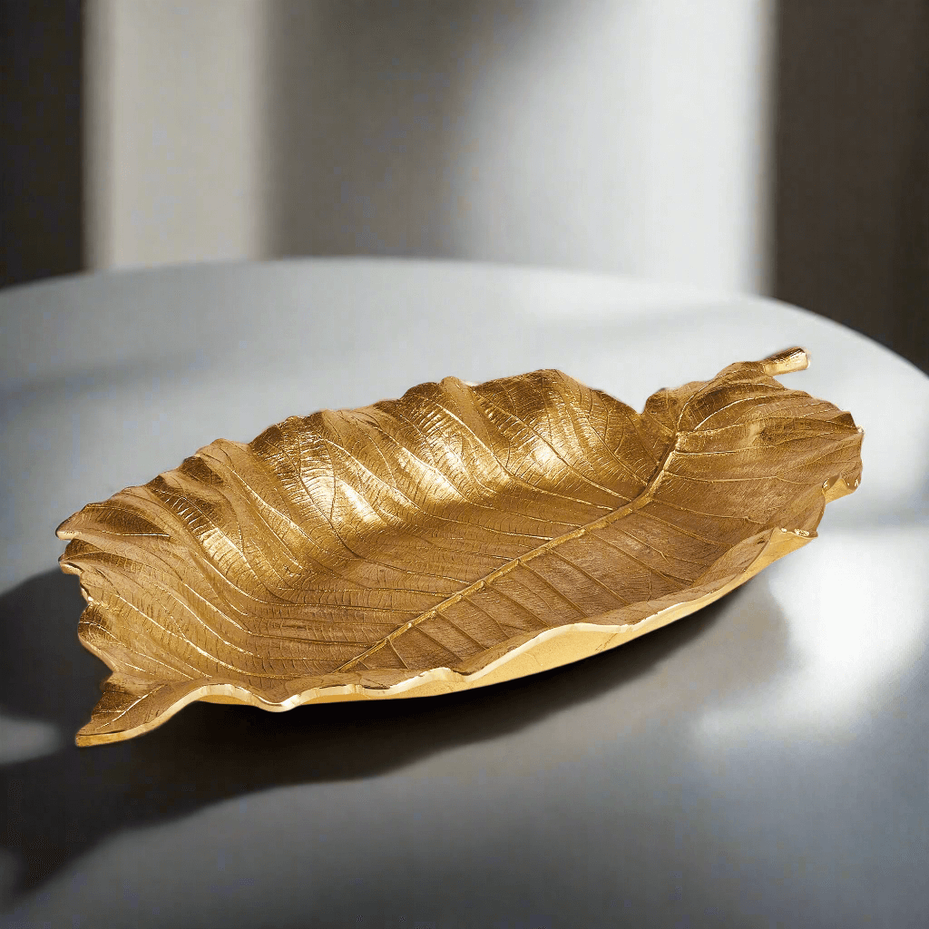 Antique Gold Leaf Shaped Accent Tray placed on a table
