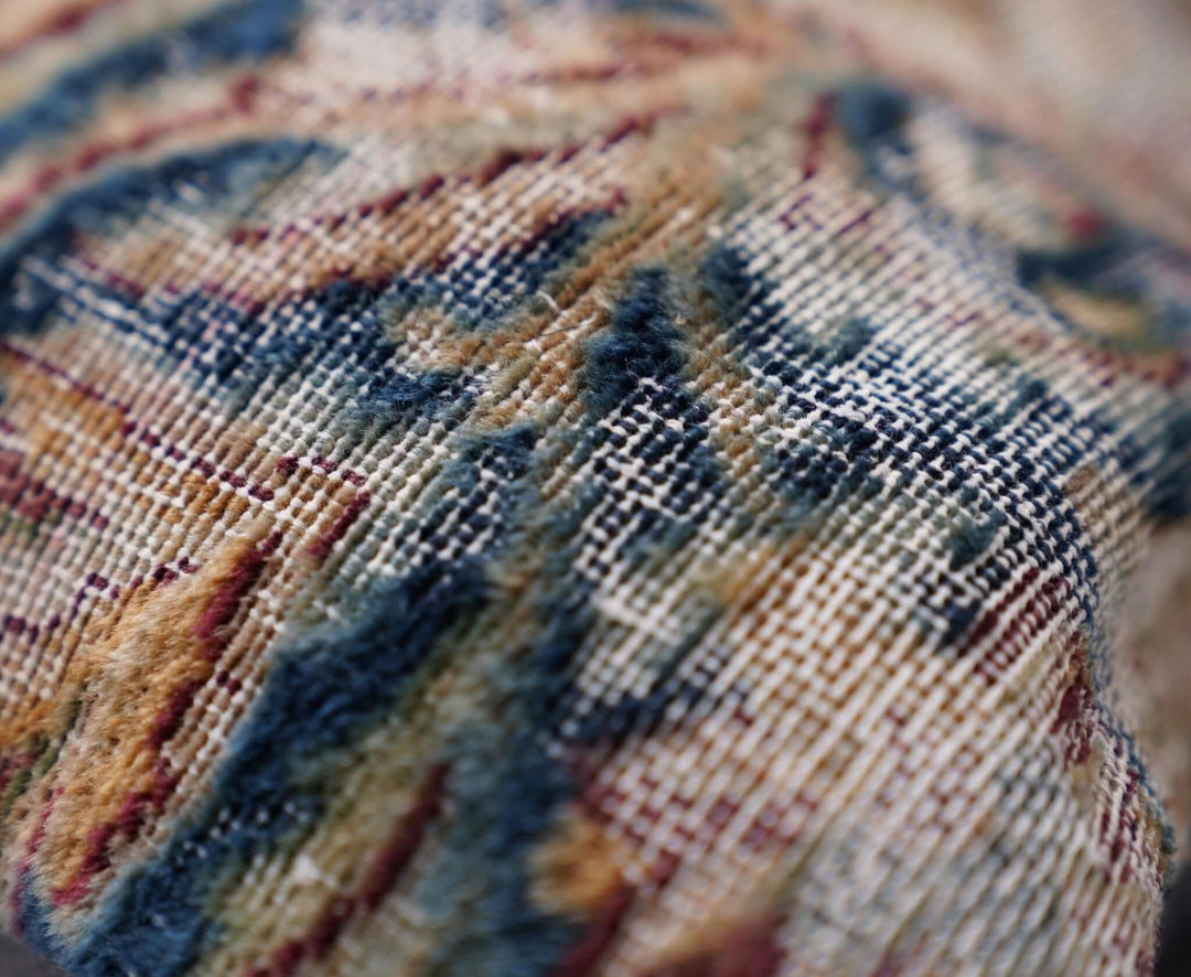 Close-up of a textured fabric with a checkered pattern