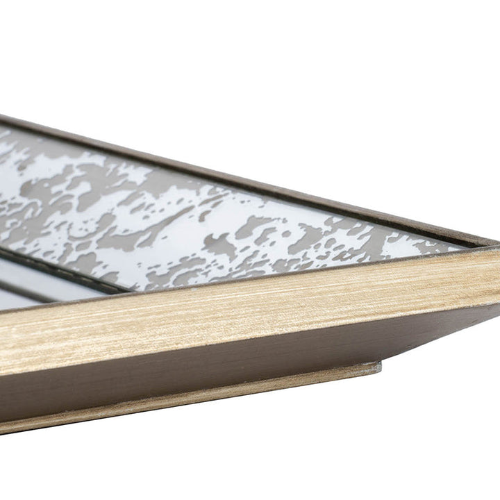 Decorative tray with metallic pattern on a white background