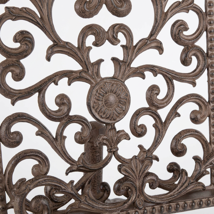 Close-up of the Bellavita holder's central rosette and ornate acanthus scrollwork