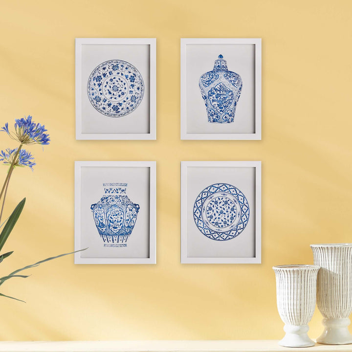 Blue and White Chinoiserie Ginger Jar and Plate Prints hung on yellow wall