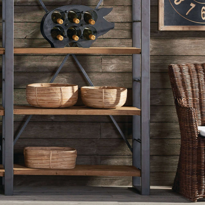 Boho Round Cane Rattan Nesting Bowls placed on a shelf
