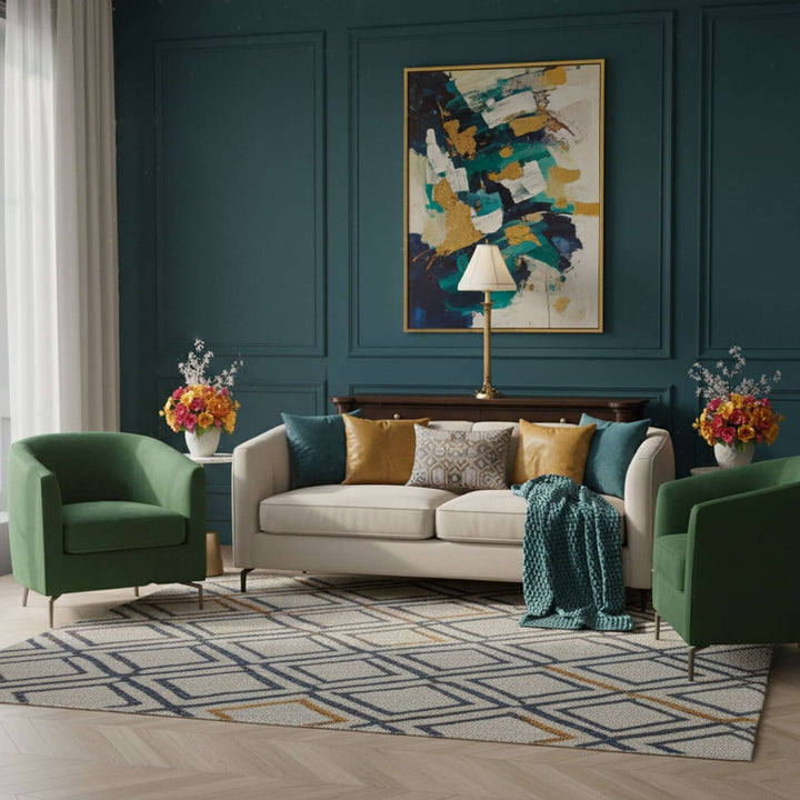 Modern living room with a beige sofa, green armchair, abstract painting, and decorative elements.