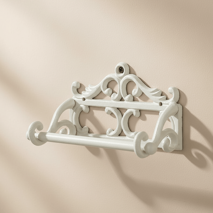 Antique-Style Cast Iron Toilet Paper Holders on a beige background