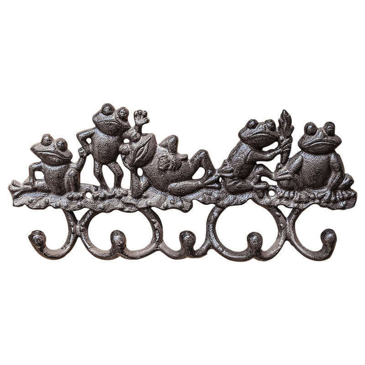 Decorative metal wall hook with frog design on a white background