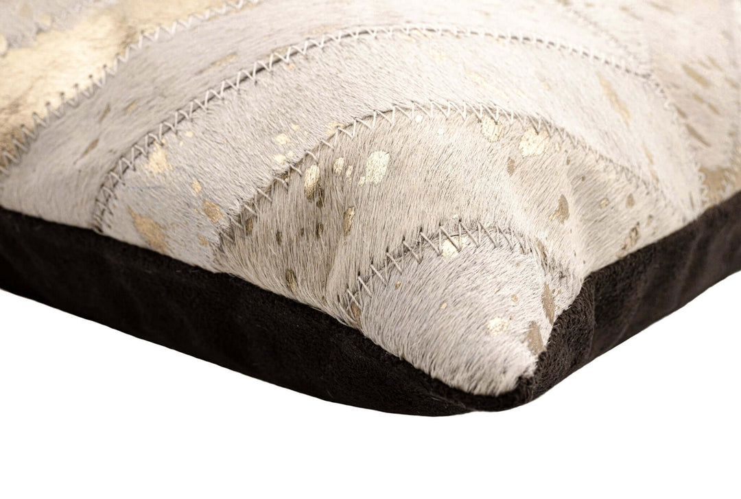 Close-up of a textured pillow with a patterned design on a white background