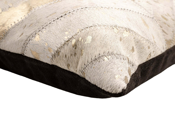 Close-up of a textured pillow with a patterned design on a white background