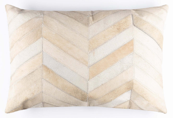 Beige and white chevron patterned pillow on a white background