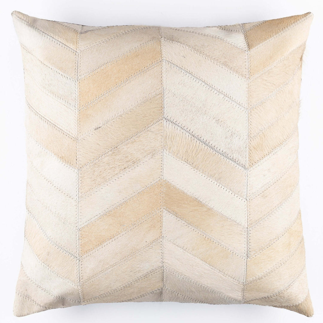 Decorative pillow with a chevron pattern in beige and white on a white background