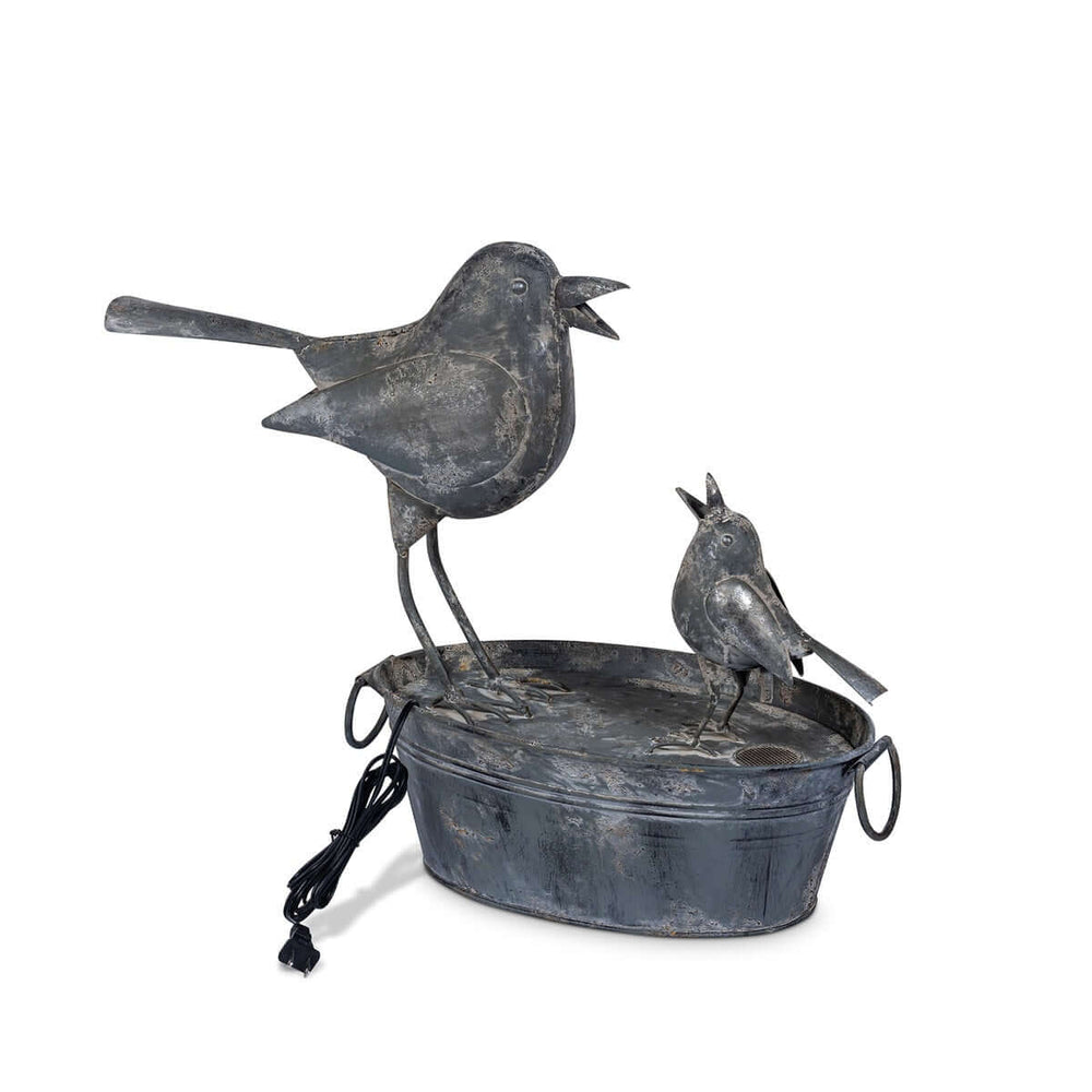 Vintage Galvanized Bird Fountain with mother and baby bird design, echoing a tranquil cottage garden ambiance.