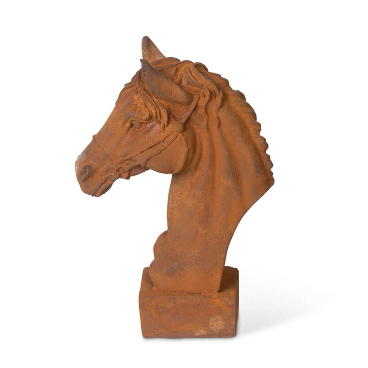 Aged cast iron horse head sculpture with rust patina, ideal for equestrian decor. Evokes elegance and strength of thoroughbreds.