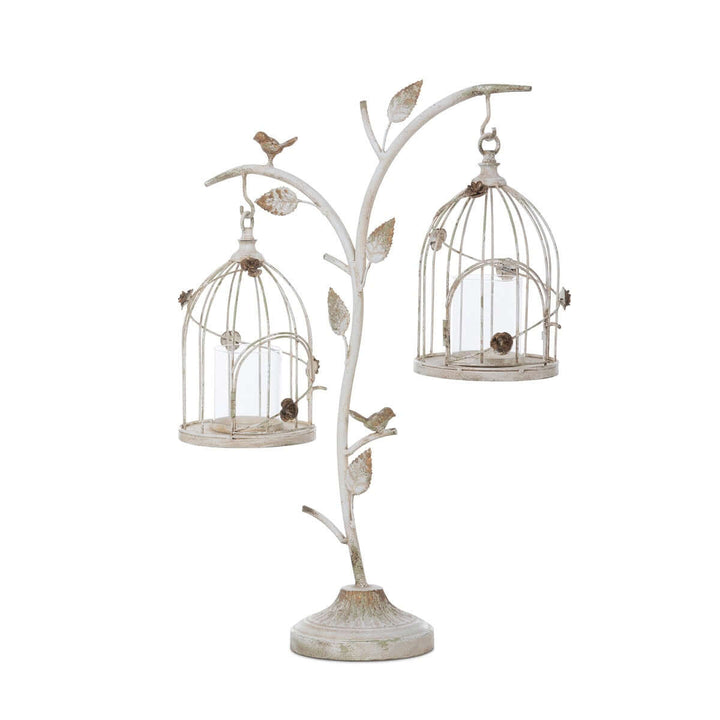 Vintage birdcage candle holder with hanging lanterns and distressed iron finish, evokes old-world charm and antique elegance.