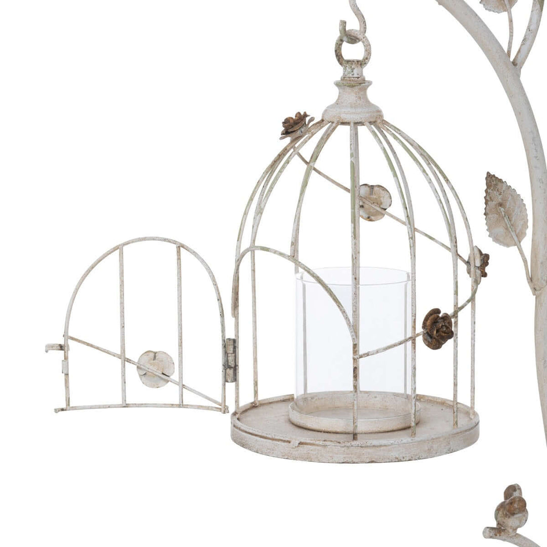 Vintage birdcage candle holder with antique white finish and hanging lanterns for decorative home accents, distressed iron design.