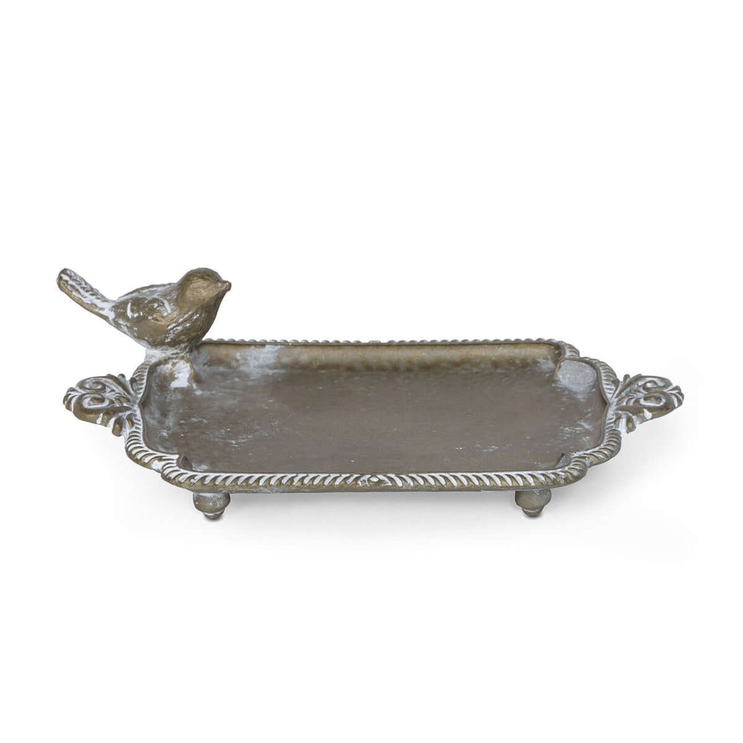 Antique brass bird soap dish with vintage patina, perfect for farmhouse decor.