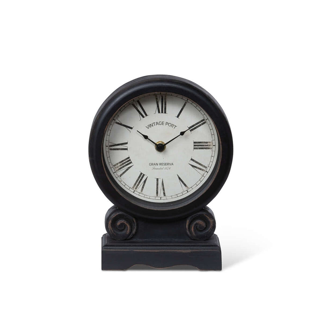 Antique-style mantel clock with Roman numerals and distressed black finish
