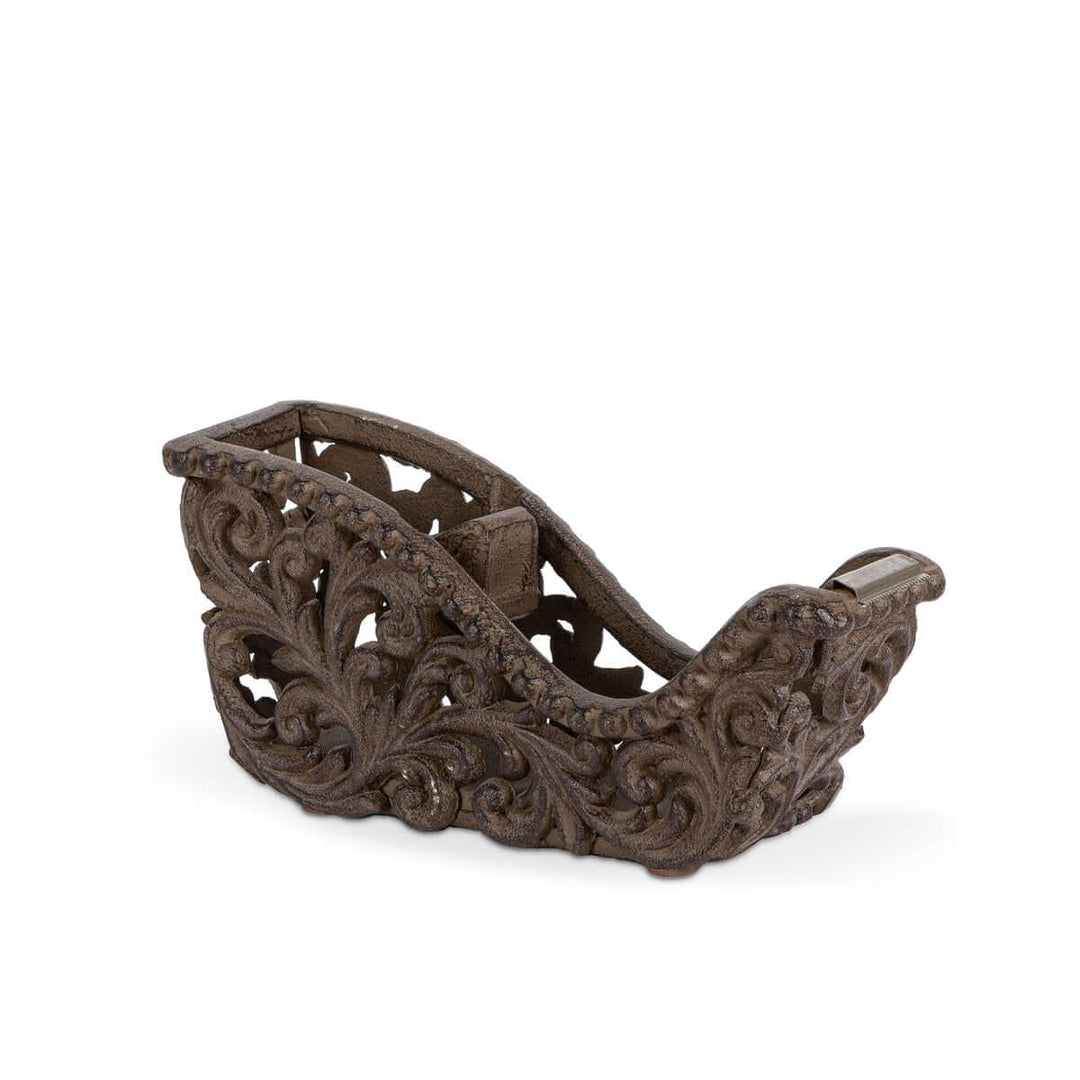Ornate tape dispenser with Acanthus leaf design, antique finish, blending functionality with classical beauty for desk decor.