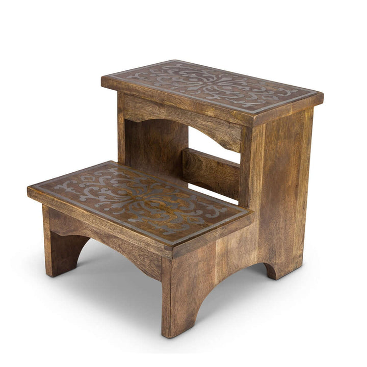 Wooden step stool with decorative metal inlay, hand-carved mango wood, intricate scrollwork, 19-inch two-step design for home utility.