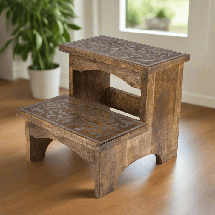 Wooden step stool with decorative metal inlay, hand-carved mango wood with intricate scrollwork design, 19-inch height.