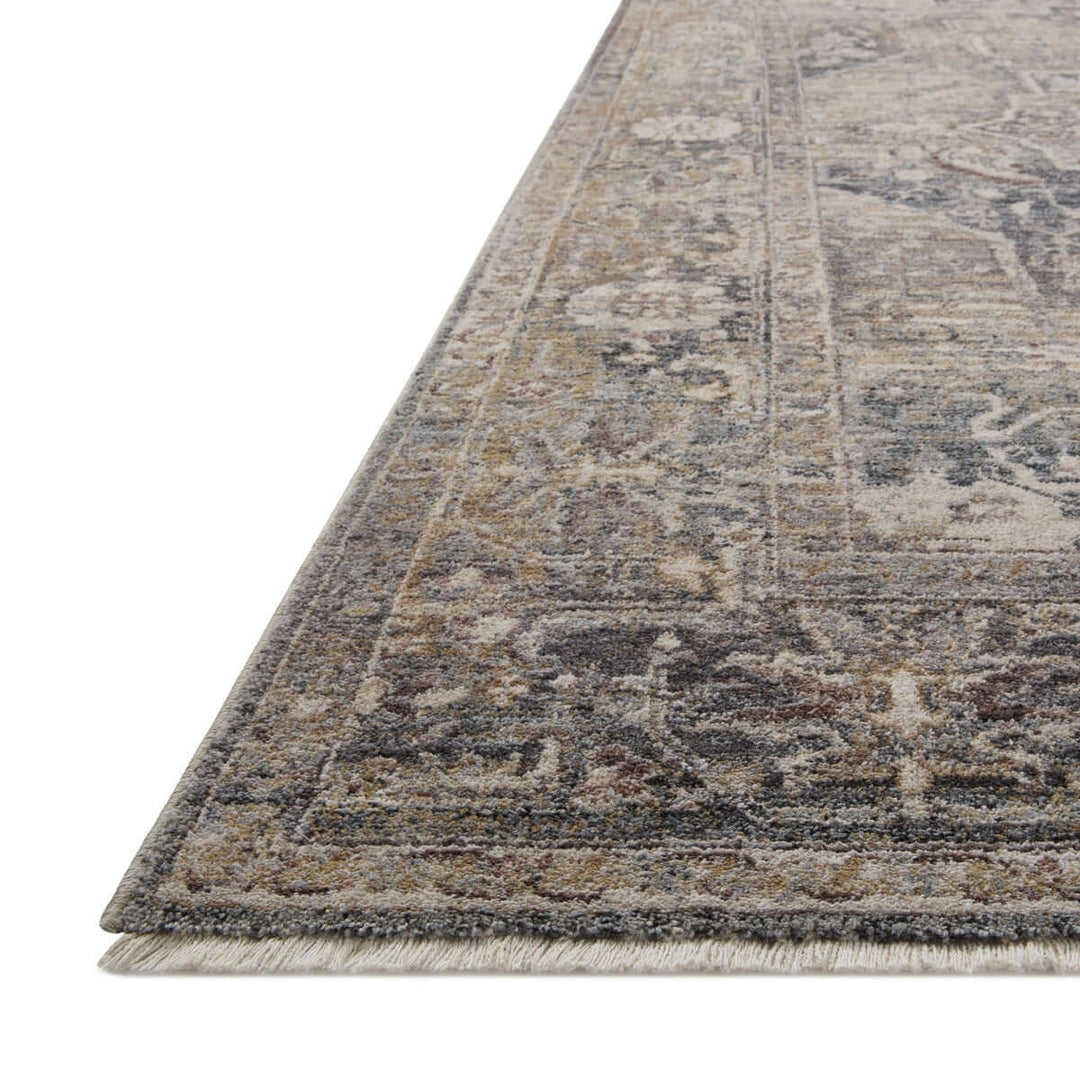 Traditional distressed loomed rug with vintage medallion design, featuring a soft, antique finish and intricate detailing.