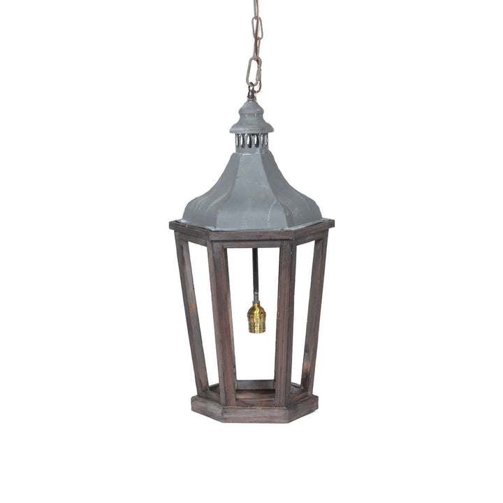 Decorative hanging lantern with wooden frame and metallic top on a white background