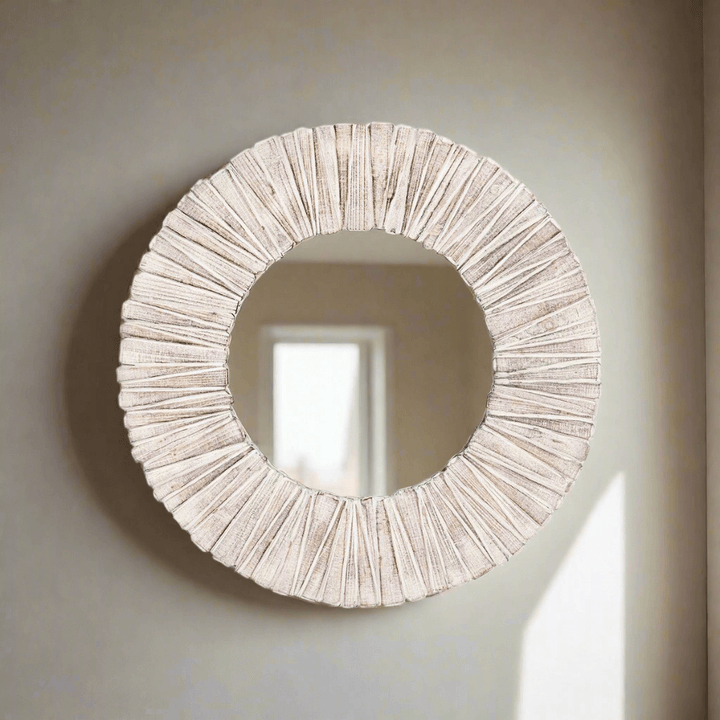 Whitewashed wood slat round wall mirror with rustic handcrafted design reflecting subtle textures and natural beauty.