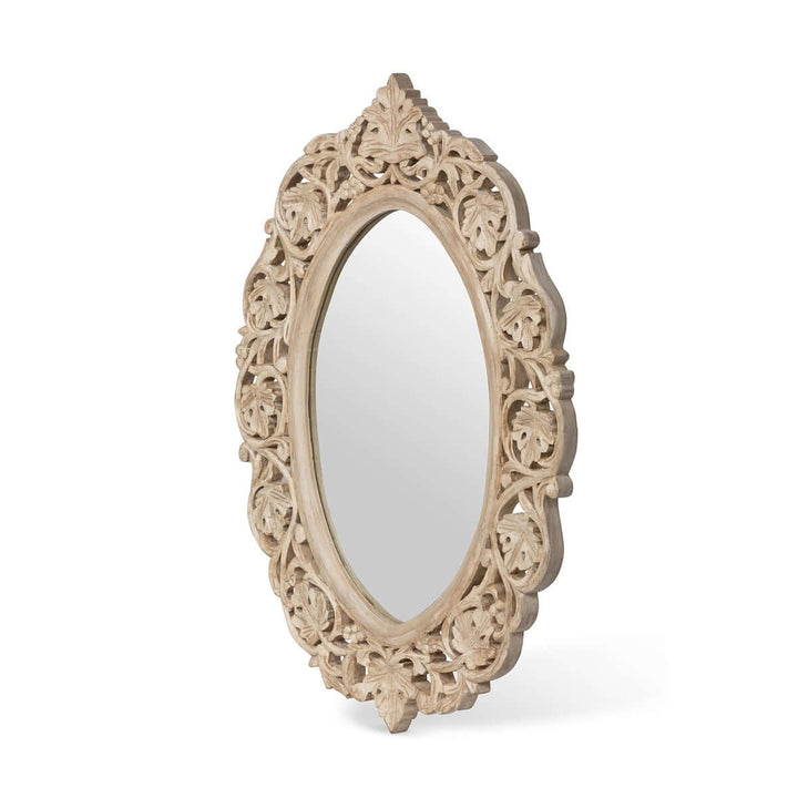 Vintage hand carved wood wall mirror with intricate floral scrollwork and elegant oval frame.
