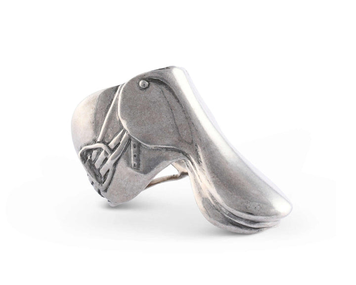 Silver saddle-shaped napkin ring on a white background