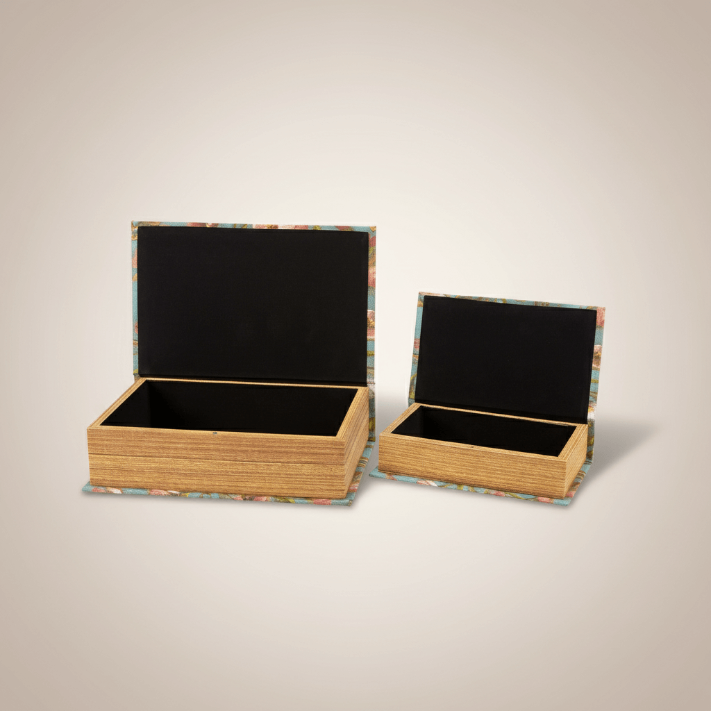 Two wooden boxes with colorful patterns on a light gray background