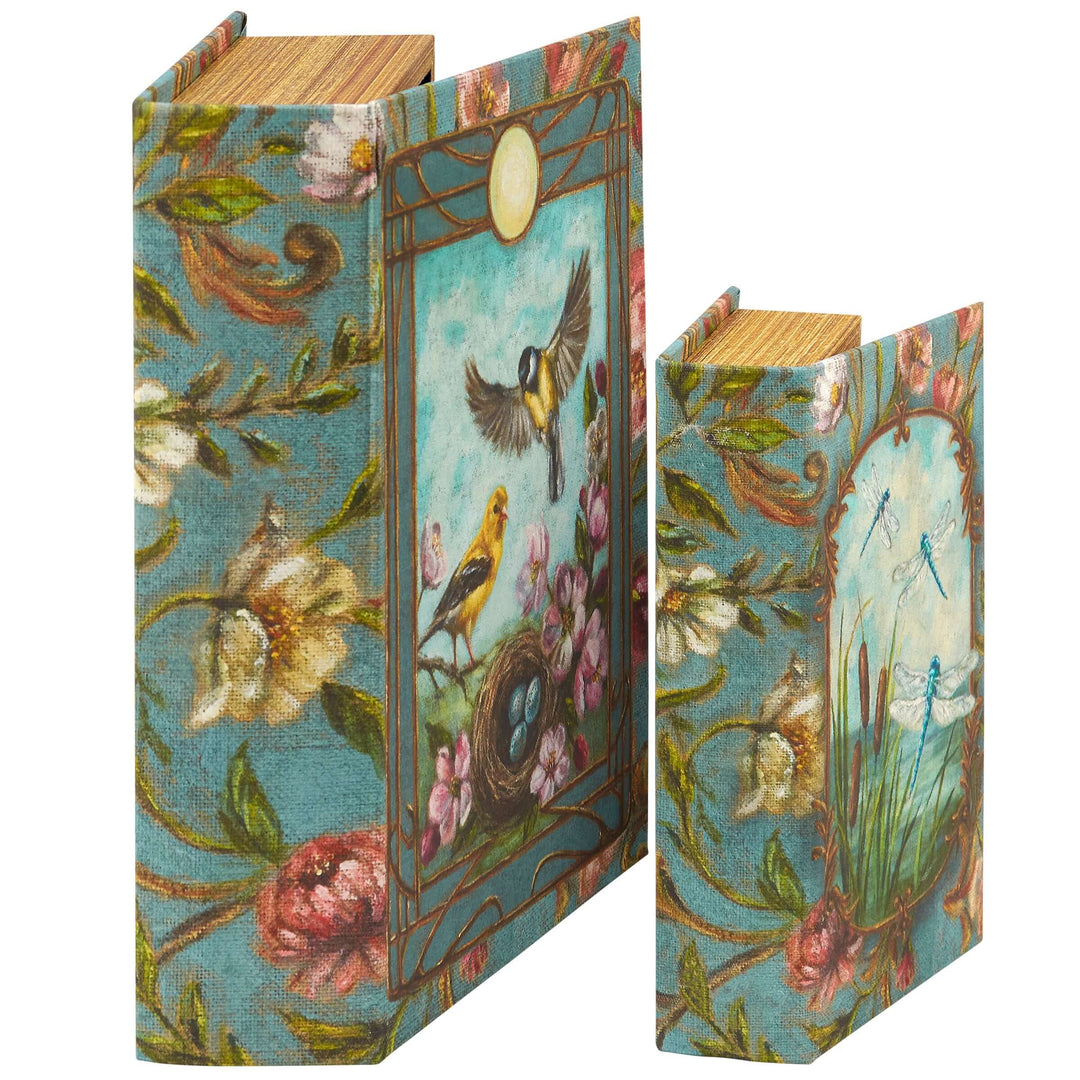 Decorative book with floral and bird design on a white background