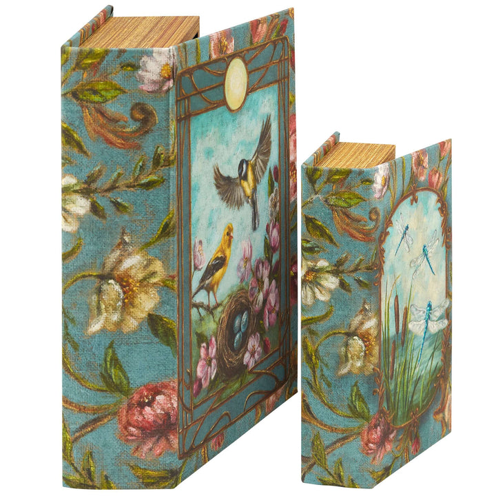 Decorative book with floral and bird design on a white background