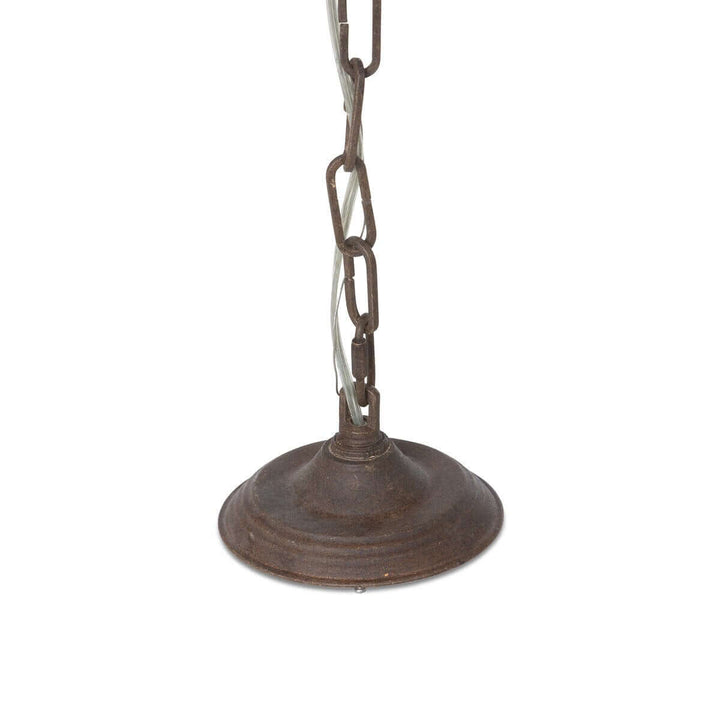 Rust-colored metal chain hanging from a circular metal base on a white background