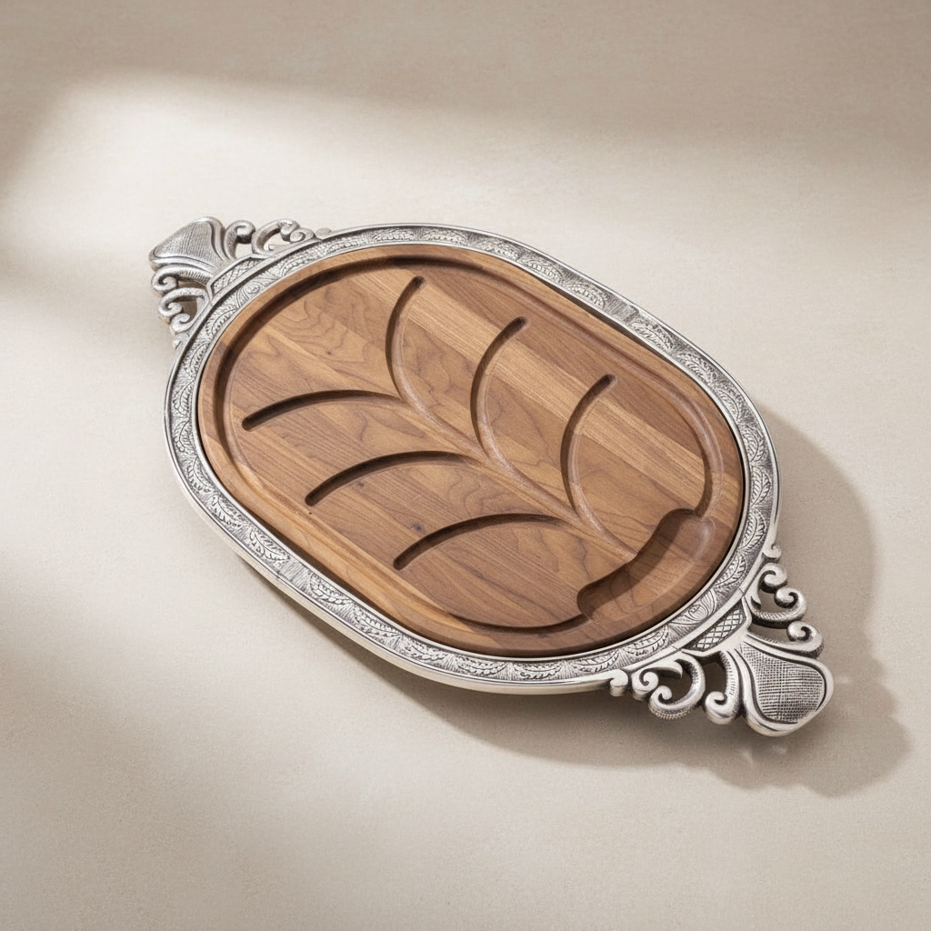 Wooden serving board with silver decorative edge on a beige background