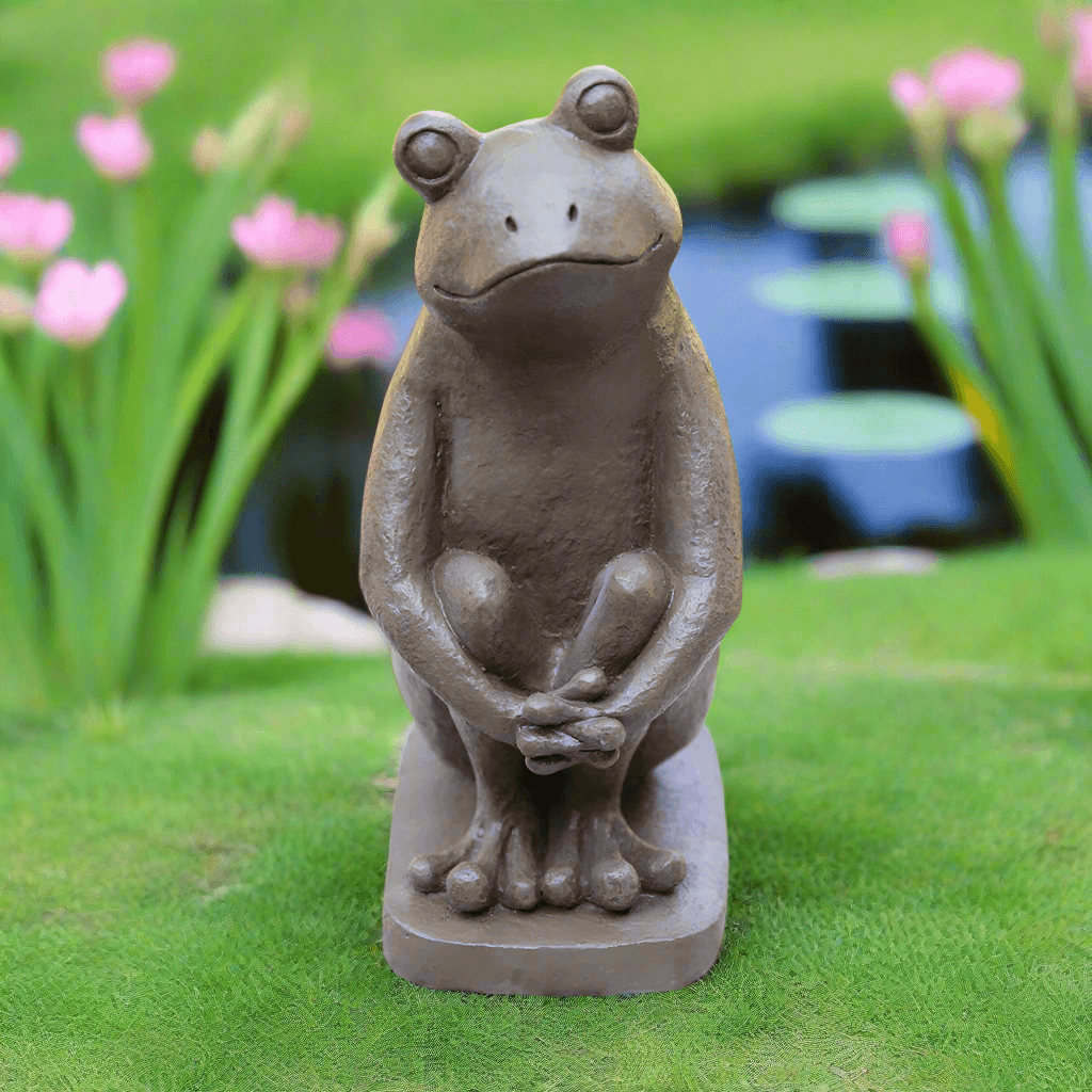 Whimsical Frog Garden Statue with a serene expression, perfect for adding character to outdoor decor.