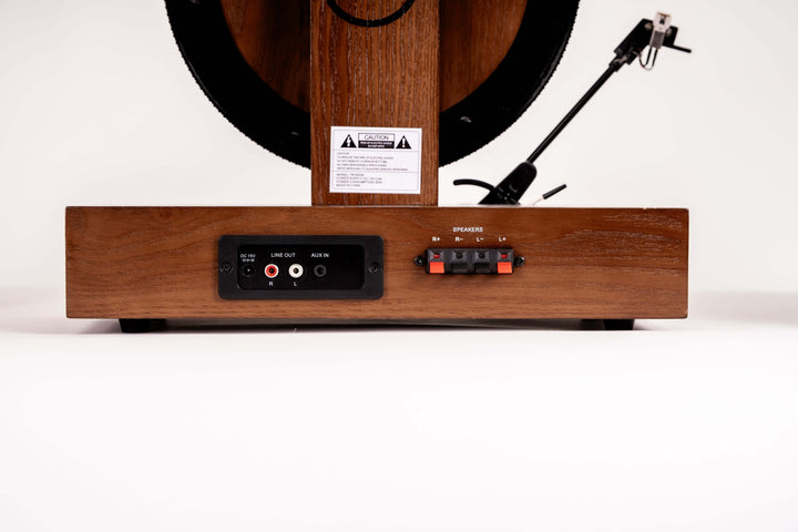 Wooden record player with control panel on a white background