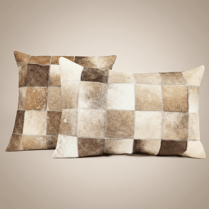 Two checkered pillows with brown and beige pattern on a beige background