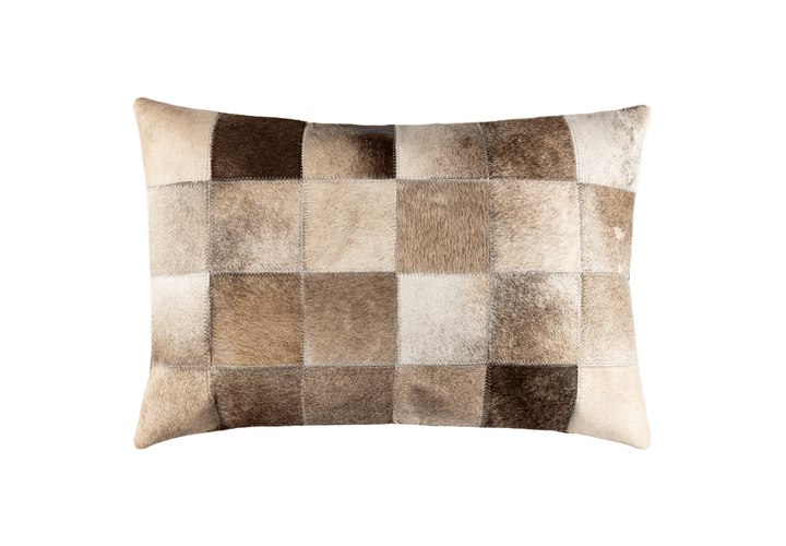Patchwork pillow with brown and beige squares on a white background
