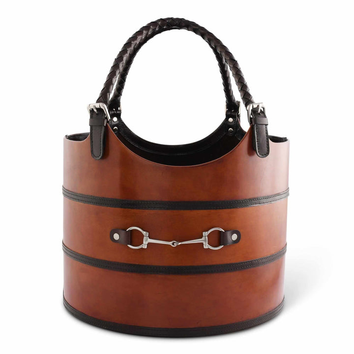 Brown leather magazine basket with black accents on a white background
