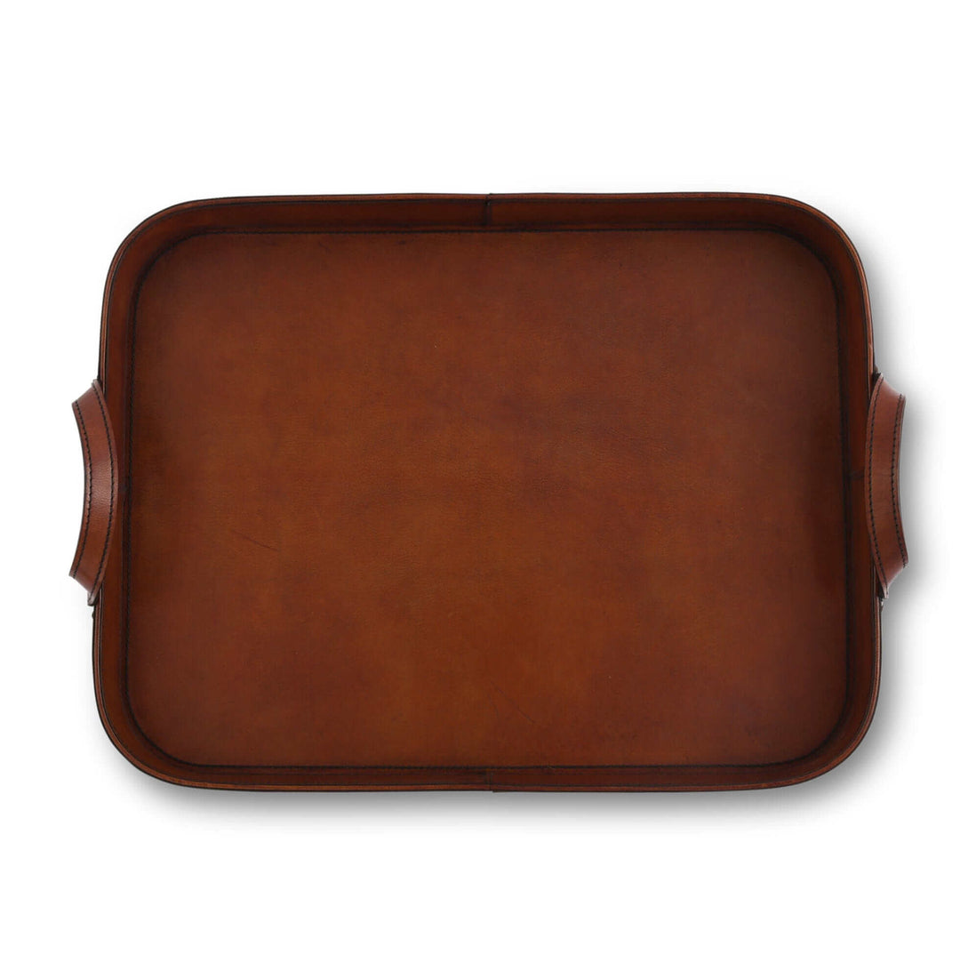 Brown leather tray with handles on a white background